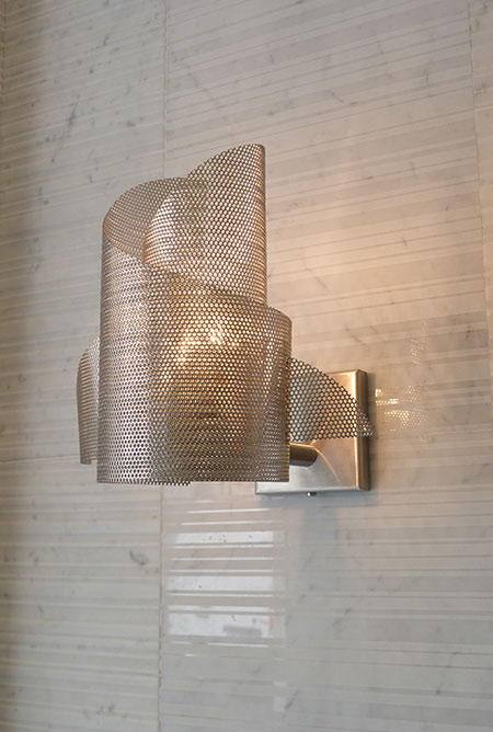 Custom wave wall light in brass